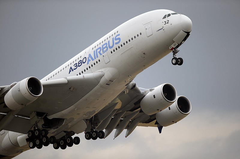 
              FILE - In this June 18, 2015 file photo, an Airbus A380 takes off for its demonstration flight at the Paris Air Show, in Le Bourget airport, north of Paris. Airbus announced Wednesday Jan. 11, 2017 that it delivered 688 planes over the year, primarily in the single-aisle A320 family, compared with 635 in 2015. The company increased deliveries of its long-delayed A350 wide-body. (AP Photo/Francois Mori, File)
            
