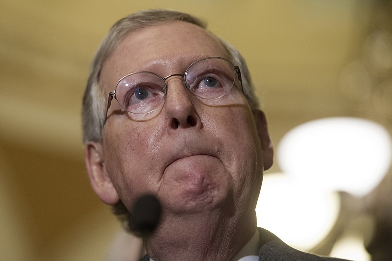 FILE - In this Jan. 4, 2017 file photo, Senate Majority Leader Mitch McConnell of Ky. pauses during a news conference on Capitol Hill in Washington. The Republican-led Senate is poised to take a step forward on dismantling President Barack Obama’s health care law despite anxiety among some GOP senators that they still haven’t come up with an alternative.  (AP Photo/Cliff Owen, File)