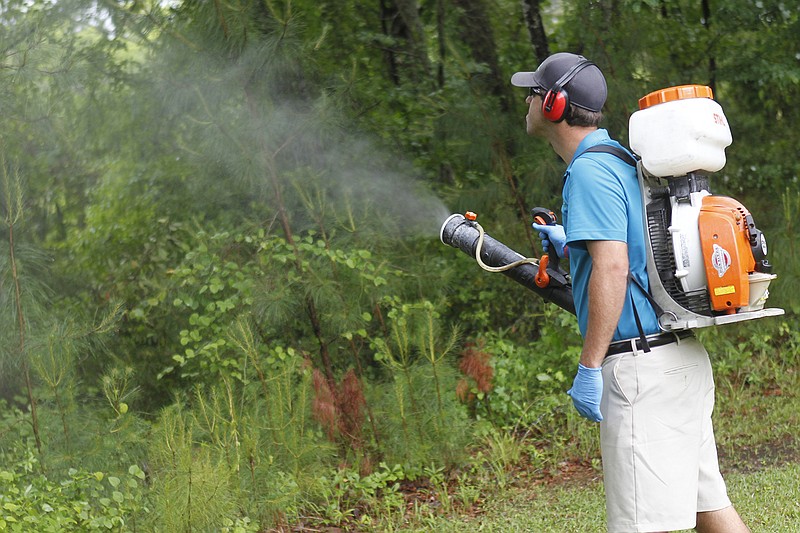 
              FILE - In this Friday, May 16, 2014, file photo, Daniel Lewis, Mosquito Authority, sprays to kill mosquitos before the summer season, in Jacksonville, N.C. From landscaping to cleaning to pest control, businesses in maintenance industries that service residences and commercial buildings saw a 13 percent increase in sales in 2016, according to Sageworks. If you gain the right expertise, Sageworks analyst James Noe says, these businesses are easy to start because they have relatively low upfront costs and don’t require large inventory, staff or dedicated office space. (Maria Sestito/The Jacksonville Daily News via AP, File)
            