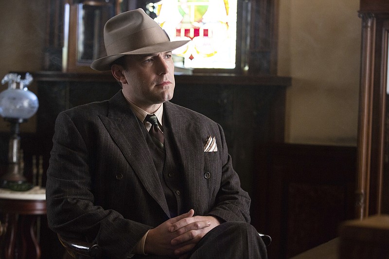 This image released by Warner Bros. Entertainment shows Ben Affeck in a scene from "Live By Night." (Claire Folger/Warner Bros. Entertainment via AP)