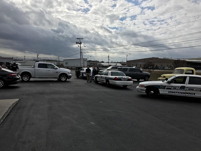 Chattanooga police investigate a man suspected of using deceptive practices to obtain spent casings at shooting ranges in multiple states. Part of the operation happened at Shooter's Depot on Shallowford Road today, when multiple police cars swarmed to the business around 12:45 p.m. (Photo by Amiee Smith)