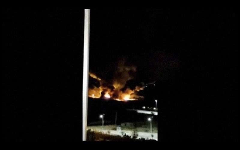 
              This image made from video shows the aftermath of an Israeli airstrike near a military airport west of Damascus, Syria on Friday, Jan. 13, 2016. Syria says Israel has launched missiles that hit near a military airport west of Damascus, triggering a fire. In a statement carried on the official news agency SANA, the military says the missiles were launched early on Friday and fell in the vicinity of the Mezzeh military airport. (Yomyat Kzefeh Hawen fi Dimashq via AP)
            