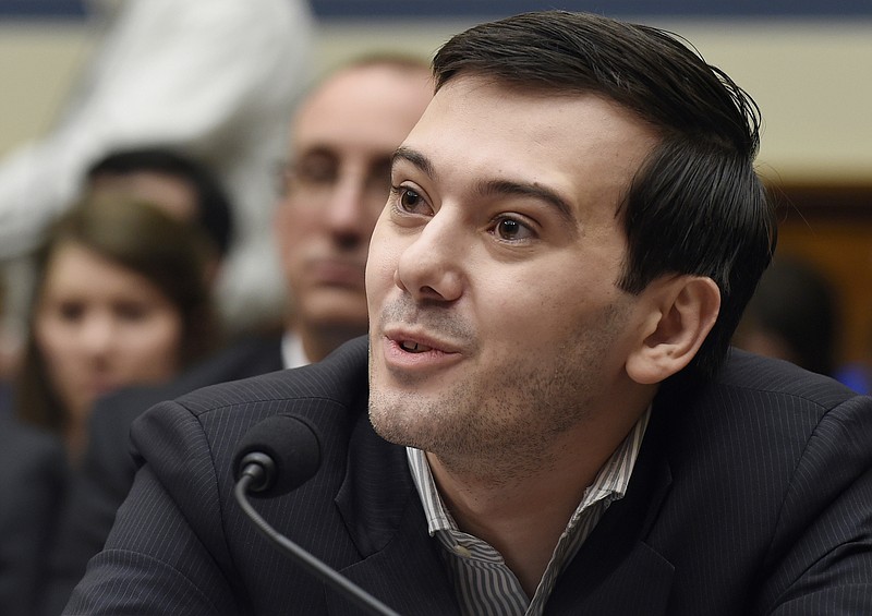 
              FILE - In this Feb. 4, 2016 file photo, pharmaceutical chief Martin Shkreli speaks on Capitol Hill in Washington during the House Committee on Oversight and Reform Committee hearing on a decision by his former company, Turing Pharmaceuticals, to significantly raise the price of the anti-parasitic medication Daraprim. Heated protests at the University of California, Davis brought the cancellation of planned speeches by far-right commentator Milo Yiannopoulos and former pharmaceutical executive Shkreli shortly before the event was to begin. University police put up barricades as protesters shouting "shut it down" grew increasingly rowdy in the hours leading up to the talks on Friday night, Jan. 13, 2017. (AP Photo/Susan Walsh, File)
            