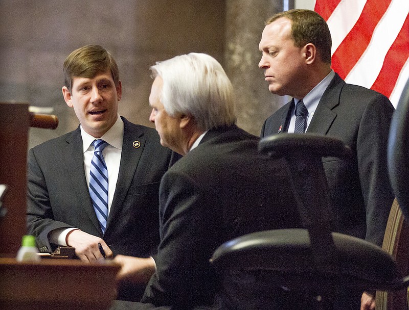 FILE – In this Jan. 23, 2014, file photo, Lance Frizzell, right, and Sen. Brian Kelsey, R-Germantown, left, meet with then-Senate Speaker Ron Ramsey at the state Capitol in Nashville, Tenn. (AP Photo/Erik Schelzig, file)