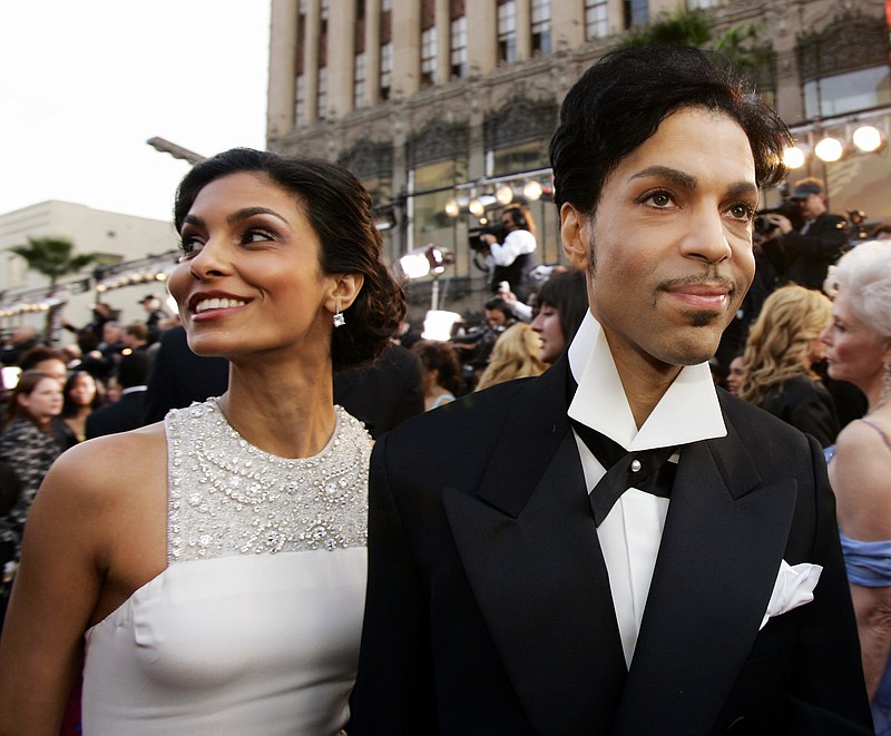 
              FILE - In this Feb. 27, 2005 file photo, singer Prince arrives with his wife Manuela Testolini for the 77th Academy Awards in Los Angeles. Records from the late megastar’s divorce from Testolini were unsealed Friday, Jan. 13, 2017, by a judge’s order. The Minneapolis Star Tribune went to court to unseal the files, which show Testolini said the couple threw lavish parties after major awards shows. The couple’s divorce was granted in 2007.  Prince died of an accidental painkiller overdose on April 21, 2016. (AP Photo/Kevork Djansezian, File)
            