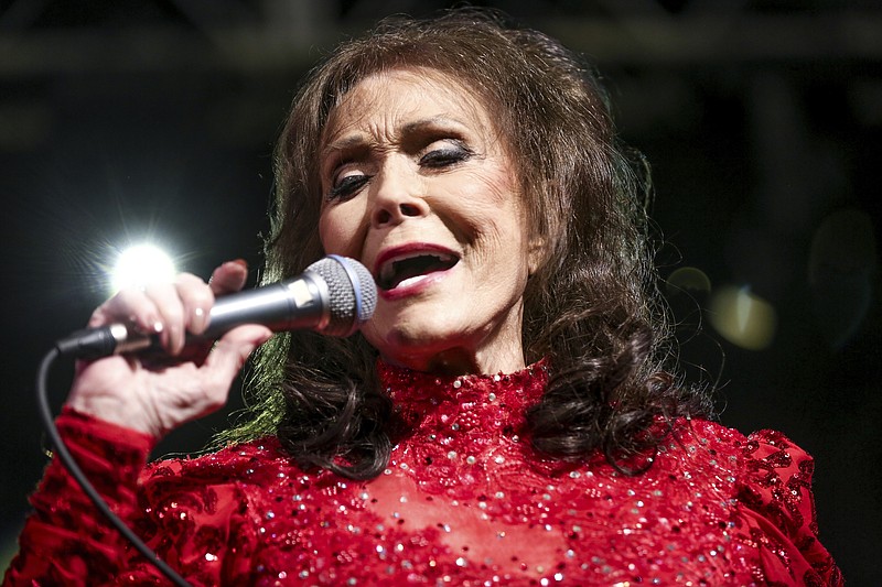 In this March 17, 2016, file photo, Loretta Lynn performs at the BBC Music Showcase at Stubb's during South By Southwest in Austin, Texas. The Country Music Hall of Fame and Museum will feature exhibits on Lynn, Faith Hill and Tim McGraw, Jason Aldean, and Shania Twain in 2017. The museum announced Friday, Jan. 13, 2017 their slate of exhibitions for the new year, which also includes a new exhibition called American Currents, focusing on music from 2016. (Photo by Rich Fury/Invision/AP)
            