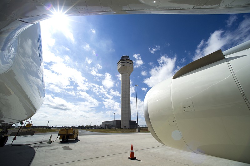 
              In this photo taken Sept. 27, 2016, the Dulles International Airport Air Traffic Control Tower is seen from the door of a Boeing 777 aircraft in Sterling, Va. The Federal Aviation Administration (FAA) isn't prepared to handle major air traffic control outages despite promises to update contingency plans made after extended disruptions in 2014 and 2015, a government watchdog said Friday, Jan. 13, 2017. (AP Photo/Cliff Owen)
            