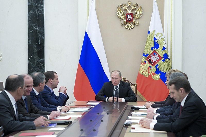 
              Russian President Vladimir Putin chairs a Security Council meeting in the Kremlin in Moscow, Russia, Friday, Jan. 13, 2017. (Alexei Druzhinin/Sputnik, Kremlin Pool Photo via AP)
            