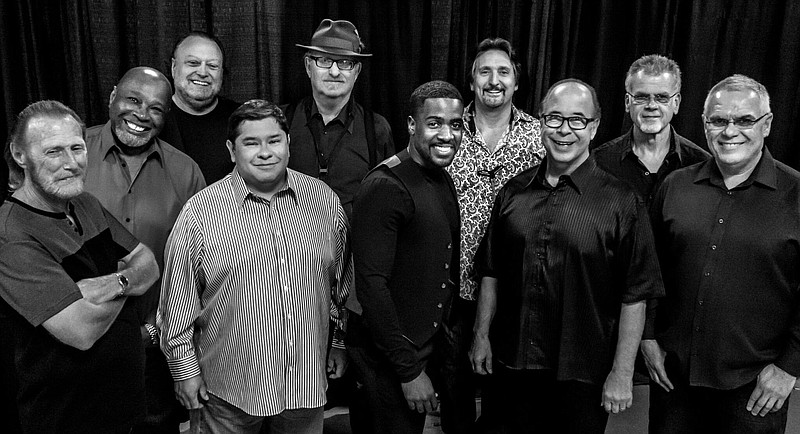 
              This Aug. 2016 photo provided by courtesy of Tower of Power/Webster Public Relations, shows the band members from Tower of Power, from left, Rocco Prestia, Roger Smith, Sal Cracchiolo, Adolfo Acosta, Stephen "Doc" Kupka, Marcus Scott, Tom E. Politzer, Emilio Castillo, David Garibaldi, and Jerry Cortez. Two members of Tower of Power, a group that has been an R&B institution for nearly 50 years, were hit by a train Thursday night, Jan. 12, 2017, as they walked across tracks before a scheduled gig in their hometown of Oakland, Calif., but both survived, their manager said. Calling it an "unfortunate accident," manager Jeremy Westby said in a statement that drummer Garibaldi and bass player Marc van Wageningen (not pictured) are "responsive and being treated at a local hospital." (Tower of Power/Webster Public Relations via AP)
            