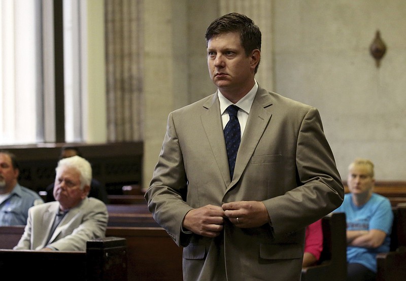 In this Aug. 18, 2016 file photo, Chicago police officer Jason Van Dyke appears at the Leighton Criminal Courts Building in Chicago. Van Dyke's case involves the shooting Laquan McDonald. The Department of Justice is poised to release its report detailing the extent of civil rights violations committed by the Chicago Police Department. The next stage after the Friday Jan. 13, 2017 release will be negotiations between the DOJ and the city. (Nancy Stone/Chicago Tribune via AP, Pool, File)
