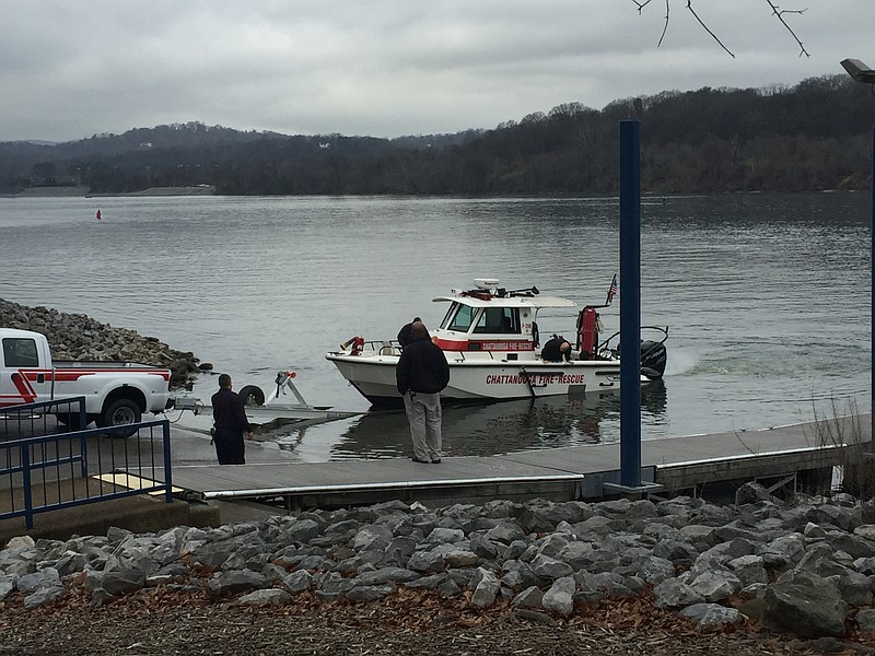 Officers are working near the boat dock at the Tennessee Riverpark.
