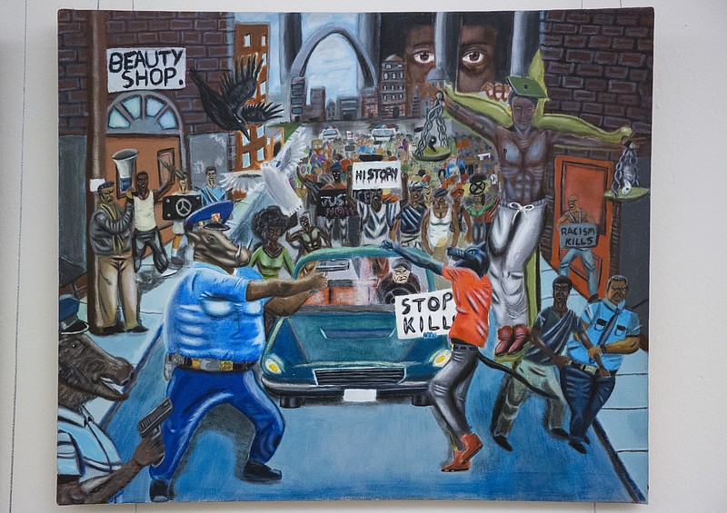 
              In this Jan. 5, 2017, photo, a painting by David Pulphus hangs in a hallway displaying paintings by high school students selected by their member of congress on Capitol Hill in Washington. A GOP congressman reported Jan. 13 that a painting stirring controversy on Capitol Hill will be taken down on Tuesday as a result of a review by the agency responsible for maintaining the Capitol complex determined it violated rules for a student arts competition. The painting depicts Ferguson, Missouri, with the image of a pig in a police uniform aiming a gun at a protester. The painting was among hundreds completed by high school students that are featured in a tunnel leading to the Capitol. (AP Photo/Zach Gibson)
            