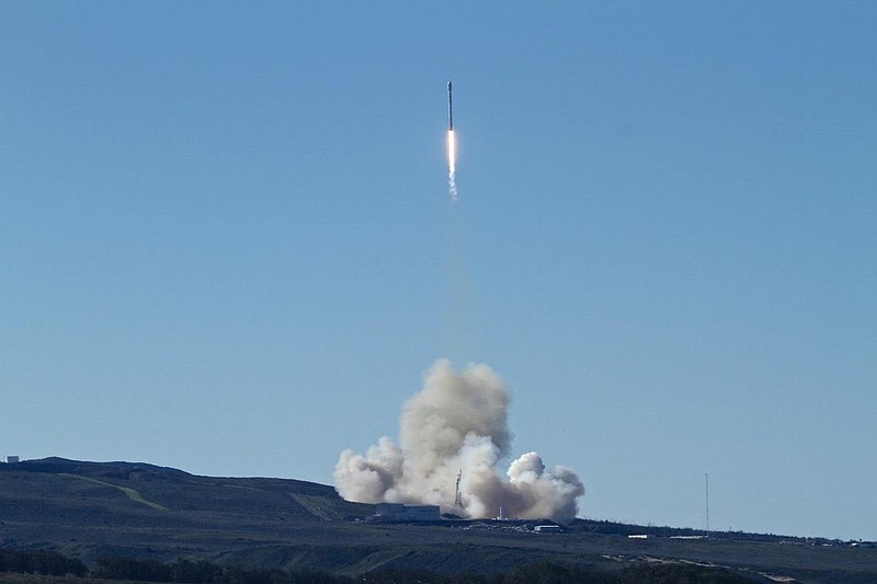 
              Space-X's Falcon 9 rocket successfully launches with 10 satellites into orbit for Iridium Communications Inc., at Vandenberg Air Force Base, Calif., Saturday, Jan. 14, 2017. About nine minutes later, the first stage returned to Earth and landed successfully on a barge in the Pacific Ocean south of Vandenberg. The return to flight is an important step for SpaceX, a California-based company that has about 70 launches in line, worth more than $10 billion. (Matt Hartman via AP)
            