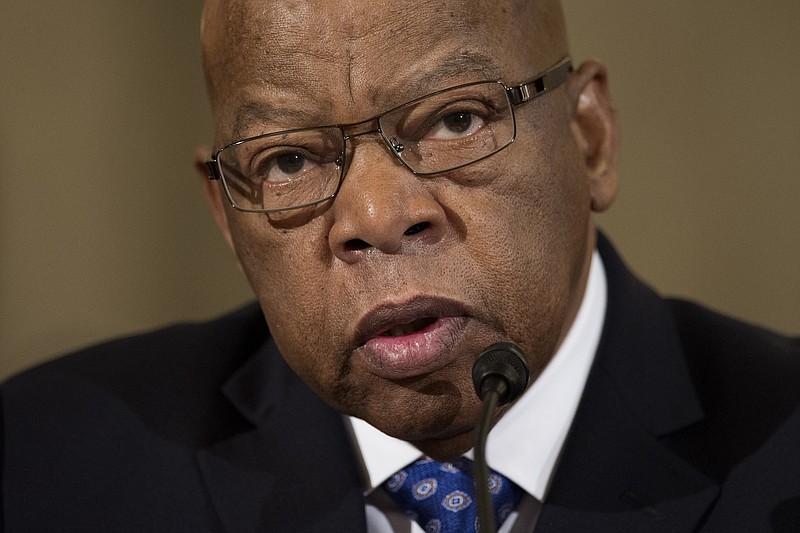In this Jan. 11, 2017 file photo, Rep. John Lewis, D-Ga. testifies on Capitol Hill in Washington at the confirmation hearing for Attorney General-designate, Sen. Jeff Sessions, R-Ala., before the Senate Judiciary Committee. Lewis says he's doesn't consider Donald Trump a "legitimate president," blaming the Russians for helping the Republican win the White House. (AP Photo/Cliff Owen, File)
