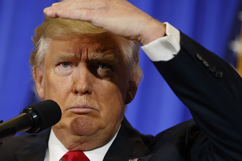 
              FILE - In this Jan. 11, 2017 file photo, President-elect Donald Trump speaks during a news conference in the lobby of Trump Tower in New York. China's Foreign Ministry has rejected President-elect Donald Trump's suggestion that he might use support of Taiwan as a bargaining chip in future negotiations between the two sides. (AP Photo/Evan Vucci, File)
            