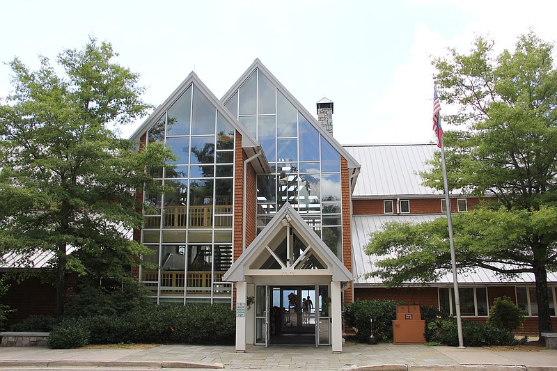 The exterior of the Amicalola Falls Lodge is seen in 2014 at Amicalola Falls State Park in Dawsonville, Ga. The state park hotel is managed by a private company. Tennessee is considering allowing a private company to run the hotel at Fall Creek Falls State Park. 