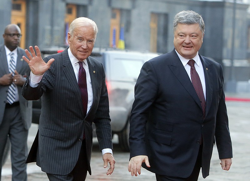 
              U.S. Vice President Joe Biden, left, and Ukrainian President Petro Poroshenko smile at the media during a meeting in Kiev, Ukraine, Monday, Jan. 16, 2017. (AP Photo/Efrem Lukatsky)
            