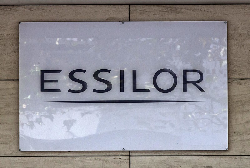 
              This Thursday, Sept. 22, 2016 photo shows the logo of the Essilor a French ophthalmic optics company, in Charenton le Pont, east of Paris. Essilor International SA announced Monday Jan.16, 2017 it had reached a share exchange deal with Luxottica's main shareholder Delfin to create a combined company making both frames and lenses. (AP Photo/Michel Euler)
            