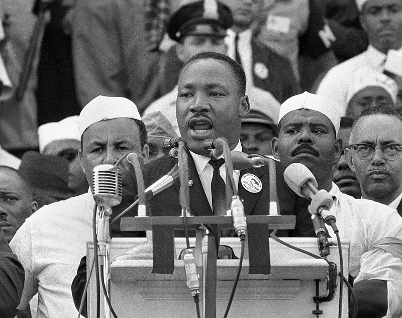 In this Aug. 28, 1963, file photo, Dr. Martin Luther King Jr., head of the Southern Christian Leadership Conference, addresses marchers during his "I Have a Dream" speech at the Lincoln Memorial in Washington. As civil rights leaders and activists gather Monday, Jan. 16, 2017, at sites across the country to celebrate the legacy of Martin Luther King Jr., the slain civil rights leader's daughter Bernice King is encouraging Americans to fight for his vision of love and justice "no matter who is in the White House." (AP Photo, File)