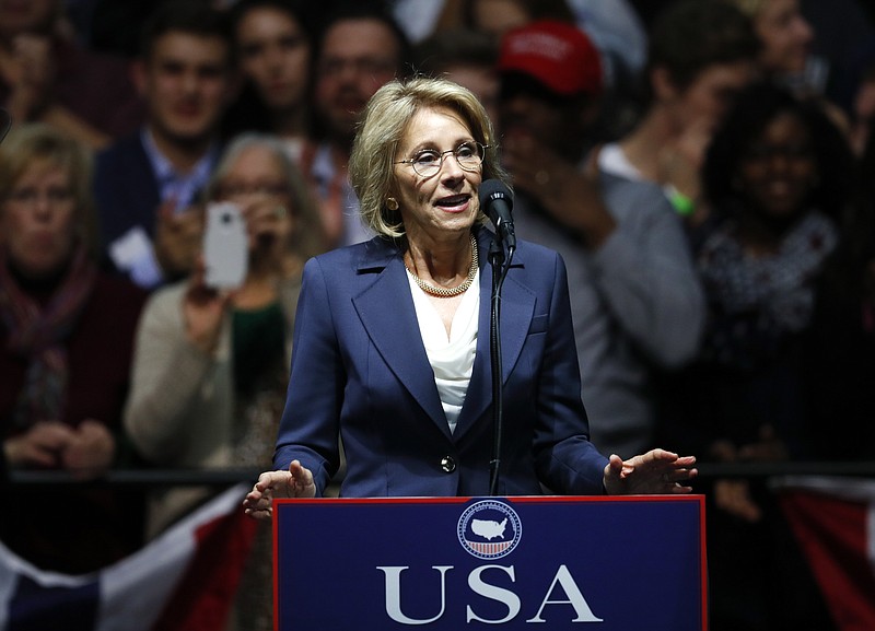 
              FILE - In this Dec. 9, 2016 file photo, Education Secretary-designate Betsy DeVos speaks in Grand Rapids, Mich.  DeVos, Trump’s choice for education secretary, has spent over two decades advocating for school choice programs, which give students and parents an alternative to traditional public school education. Her confirmation hearing was scheduled for Jan. 17. (AP Photo/Paul Sancya, File)
            