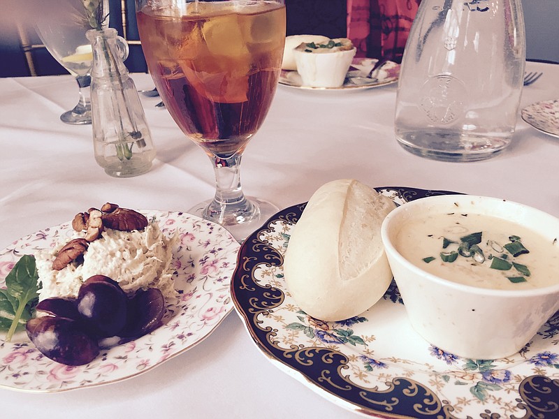 Lobster bisque and a scoop of chicken salad are served in fine china at Polly Claire's tearoom in the historic Dent House off Bonny Oaks Drive.