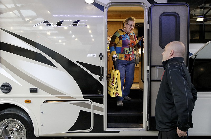 Mary Dykes steps out of a RV displayed by Camping World of Chattanooga at a previous RV Super Show.