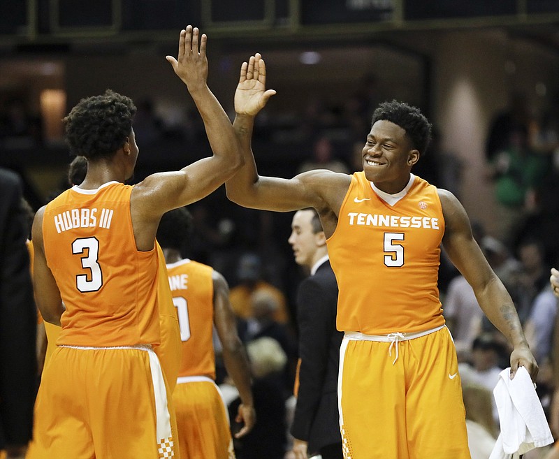 Tennessee's Robert Hubbs III (3) and Admiral Schofield (5) celebrate after Tennessee defeated Vanderbilt 87-75 in an NCAA college basketball game Saturday, Jan. 14, 2017, in Nashville, Tenn. (AP Photo/Mark Humphrey)