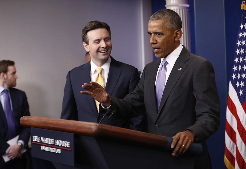 
              White House press secretary Josh Earnest listens as President Barack Obama speaks at  his final daily press briefing, Tuesday, Jan. 17, 2017, in the briefing room of the White House in Washington. (AP Photo/Pablo Martinez Monsivais)
            