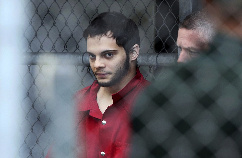 
              FILE- In this Jan. 9, 2017, file photo, Esteban Santiago is taken from the Broward County main jail as he is transported to the federal courthouse in Fort Lauderdale, Fla. Just weeks before a gunman opened fire at Fort Lauderdale's airport, he walked into an FBI office in Alaska telling authorities the government was controlling his mind and that he was having terroristic thoughts. Authorities say such walk-ins are a daily occurrence around the country. Assessing whether the people are reporting a credible threat or whether they need medical help is extremely difficult and drains already-stretched law enforcement resources. (Amy Beth Bennett/South Florida Sun-Sentinel via AP, File)
            