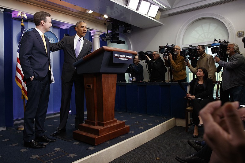 
              President Barack Obama stands with White House press secretary Josh Earnest during his last press briefing, Tuesday, Jan. 17, 2017, in the briefing room of the White House in Washington. (AP Photo/Evan Vucci)
            