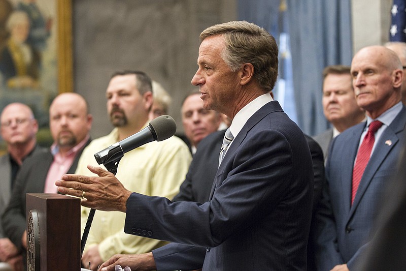 
              Republican Gov. Bill Haslam speaks at the state Capitol in Nashville, Tenn., on Wednesday, Jan. 18, 2017, about his plan to boost transportation funding while also cutting taxes. Haslam's plan would hike gas taxes by 7 cents per gallon. (AP Photo/Erik Schelzig)
            