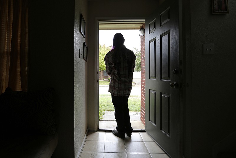 
              FILE - In this Monday, Dec. 5, 2016 file photo, a 19-year-old transgender teen, who declined to be identified because she feared for her life after receiving death threats earlier in the year at a halfway house, poses for a photo in Texas. Advocates say the nation's juvenile detention centers are largely ill-equipped to house transgender young people, leaving them vulnerable to bullying, sexual assault, depression and suicide. (AP Photo/Eric Gay)
            
