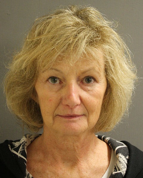 
              CORRECTS FROM LEINA TO LIANA- This booking photo released by the Harris County (Texas) Sheriff’s Office shows Elaine Yates. Two sisters who disappeared from Rhode Island with their mother Elaine Yates in 1985 have been located in the Houston area, and their mother was charged with snatching them, police announced Tuesday, Jan. 17, 2017. Yates, who had been living in Houston under the name Liana Waldberg, was arrested on Monday, Jan. 16, without incident and faces arraignment Wednesday in Rhode Island on a fugitive charge. (Harris County Sheriff’s Office via AP)
            