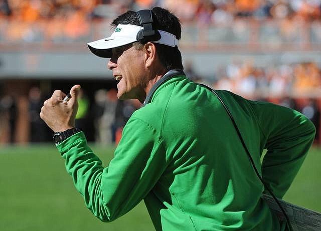 North Texas interim head coach Mike Canales shouts from the sideline during the first half against Tennessee in an NCAA college football game at Neyland Stadium in Knoxville, Tenn. on Saturday, Nov. 14, 2015. (Michael Patrick/Knoxville News Sentinel via AP)