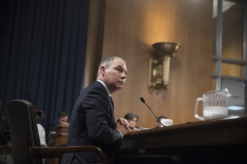 Environmental Protection Agency Administrator-designate, Oklahoma Attorney General Scott Pruitt testifies on Capitol Hill in Washington on Wednesday at his confirmation hearing before the Senate Environment and Public Works Committee. (AP Photo/J. Scott Applewhite)