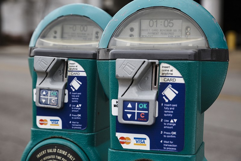 Parking meters are seen downtown Thursday, Jan. 19, 2017, in Chattanooga, Tenn. A $250,000 parking study of the city's parking is being undertaken.