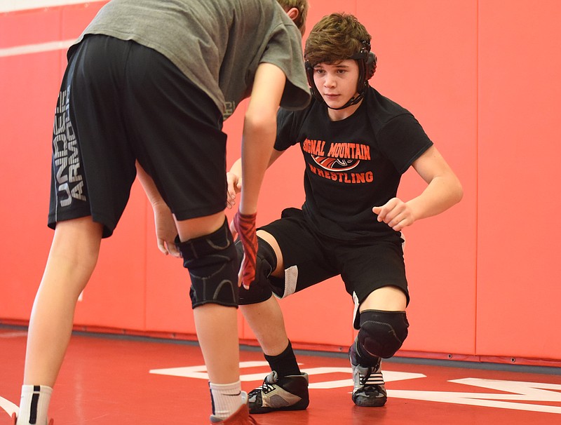 Preston Worley, right, wrestles at 132 pounds on the Signal Mountain varsity squad.