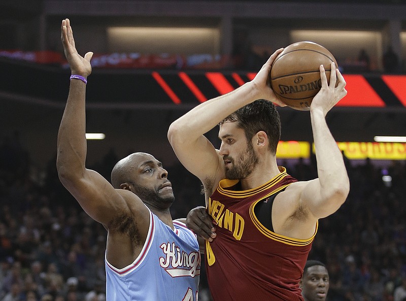 
              Sacramento Kings forward Anthony Tolliver, left, guards Cleveland Cavaliers forward Kevin Love during the first quarter of an NBA basketball game Friday, Jan. 13, 2017, in Sacramento, Calif. (AP Photo/Rich Pedroncelli)
            