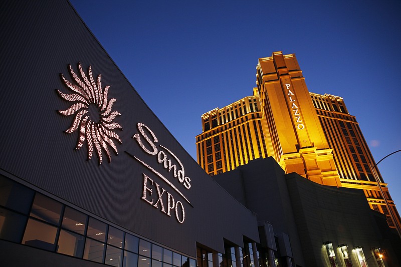 
              FILE - This June 17, 2014 file photo shows the Sands Expo and Convention Center and The Palazzo in Las Vegas. The properties are owned and operated by Las Vegas Sands Corp. U.S. authorities said Thursday, Jan. 19, 2017, that billionaire Sheldon Adelson's casino company is paying almost $7 million to settle a foreign corrupt practices investigation of the company's former relationship with a consultant in Macao and China. (AP Photo/John Locher, File)
            
