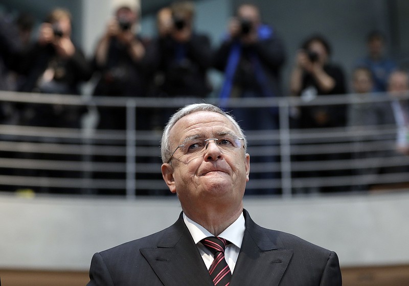 
              Martin Winterkorn, former CEO of the German car manufacturer 'Volkswagen', arrives for a questioning at an investigation committee of the German federal parliament in Berlin, Germany, Thursday, Jan. 19, 2017. (AP Photo/Michael Sohn)
            