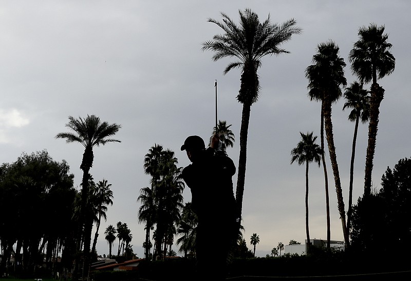 
              Phil Mickelson watches his tee shot on the third hole during the first round of the CareerBuilder Challenge at the La Quinta County Club Thursday, Jan. 19, 2017 in La Quinta, Calif. (AP Photo/Chris Carlson)
            