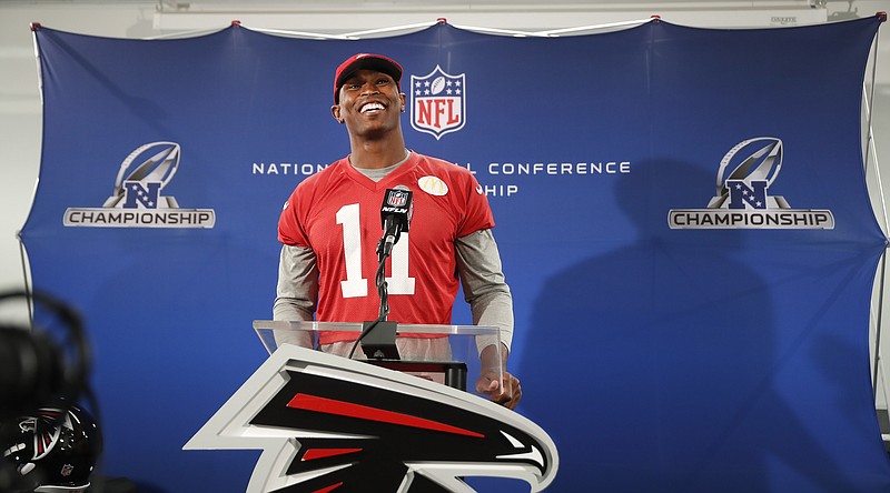 
              Atlanta Falcons receiver Julio Jones smiles as he answer a question during a news conference before an NFL football practice , Thursday, Jan. 19, 2017, in Flowery Branch, Ga.. TheFalcons will face the Green Bay Packers in the NFC Championship on Sunday in Atlanta. (AP Photo/John Bazemore)
            
