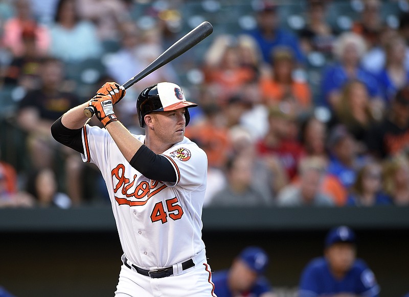
              FILE - In this Aug. 3, 2016, file photo, Baltimore Orioles' Mark Trumbo bats during the team's baseball game against the Texas Rangers in Baltimore. A person familiar with the negotiations says the Orioles have agreed to a $37.5 million, three-year contract to keep Trumbo. The person spoke to The Associated Press on condition of anonymity Thursday night, Jan. 19, because the agreement is contingent on Trumbo passing a physical. (AP Photo/Nick Wass, File)
            
