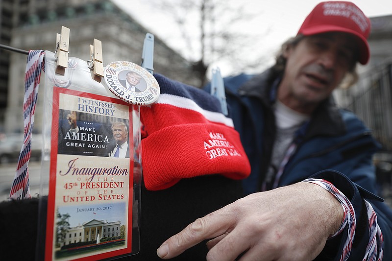 
              Vendors sell their President-elect Donald Trump wares in Washington, Thursday, Jan. 19, 2017, as preparations continue for Friday's presidential inauguration. (AP Photo/John Minchillo)
            