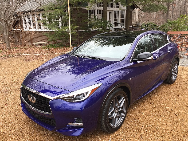 The new Inifiniti QX 30 Sport has the stance and driving virtues of a hatchback.



The interior of the QX 30 S is black with cream colored stitching and seat inserts.