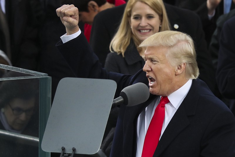 
              President Donald Trump pumps his first at the end of his speech after bring sworn in as the 45th president of the United States during the 58th Presidential Inauguration at the U.S. Capitol in Washington, Friday, Jan. 20, 2017. (AP Photo/Andrew Harnik)
            