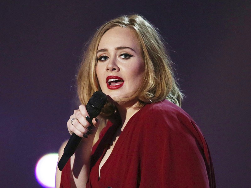 
              FILE - In this Feb. 24, 2016 file photo shows Adele onstage at the Brit Awards 2016 at the 02 Arena in London.  The Recording Academy announced Friday, Jan. 20, 2017,  that Adele will perform at the Feb. 12 show at the Staples Center in Los Angeles. Previously announced performers include Metallica, Carrie Underwood, John Legend and Keith Urban.(Photo by Joel Ryan/Invision/AP, File)
            