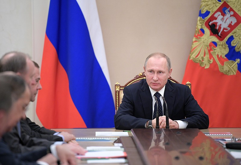 
              Russian President Vladimir Putin chairs a government meeting in the Kremlin in Moscow, Russia, Thursday, Jan. 19, 2017. (Alexei Druzhinin/Sputnik, Kremlin Pool Photo via AP)
            