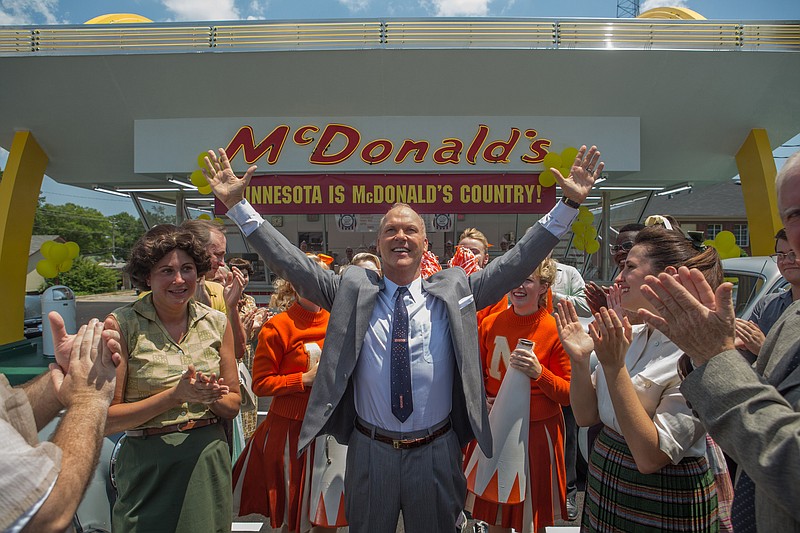 This image released by The Weinstein Company shows Michael Keaton, center, in a scene from, "The Founder." (Daniel McFadden/The Weinstein Company via AP)