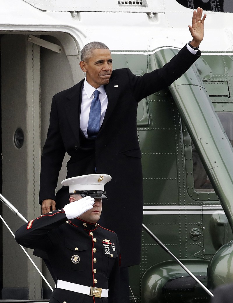 
              Former president Barack Obama waves as he boards a Marine helicopter on the East Front of the Capitol, Friday, Jan. 20, 2017, in Washington, after Donald Trump was inaugurated. (AP Photo/Evan Vucci)
            